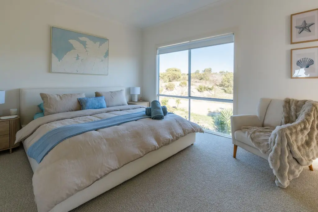 Master bedroom with king bed and bushland views
